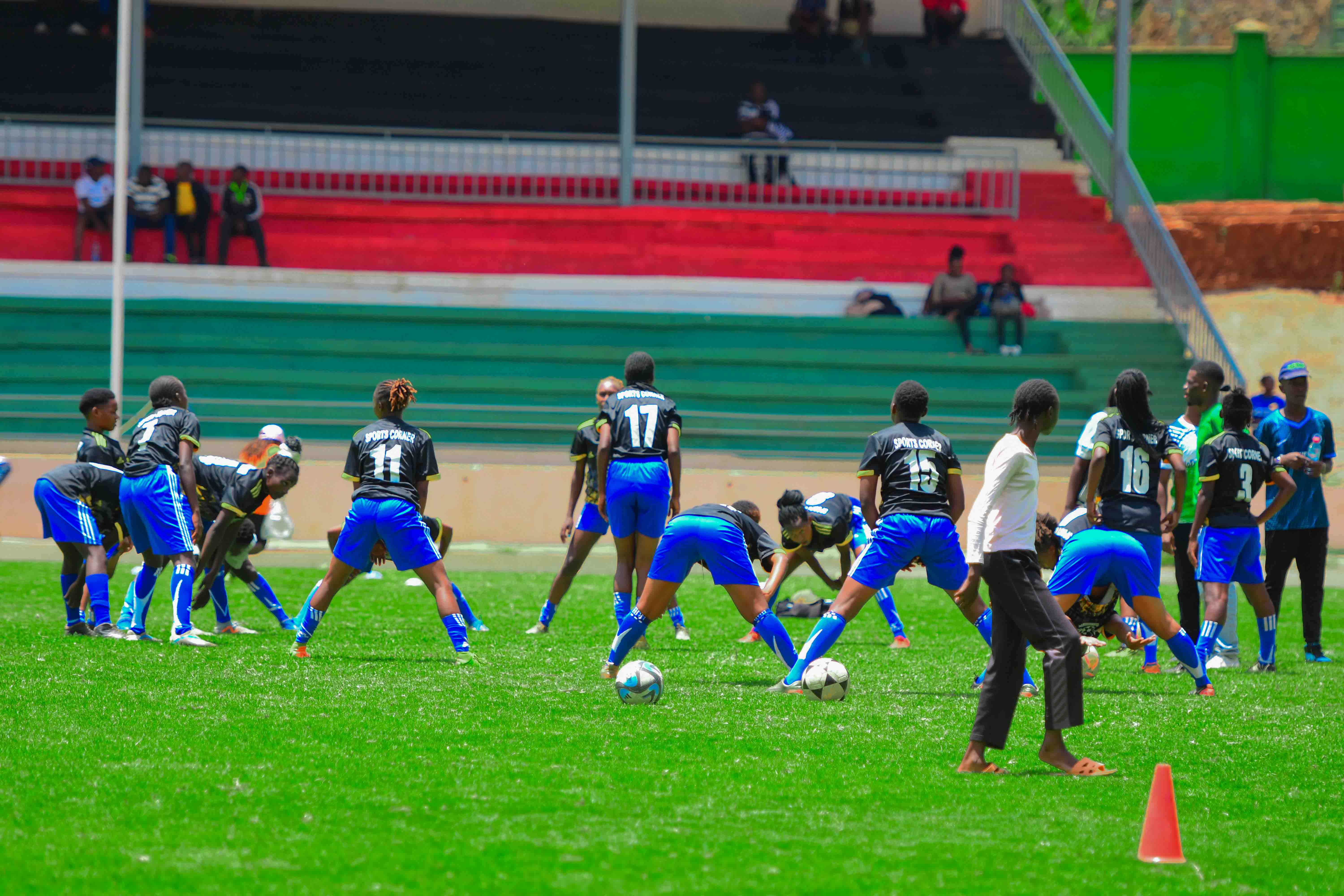 Volleyball player spiking ball during match